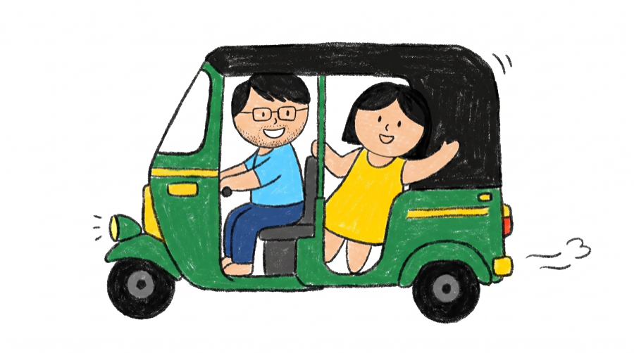 Sahil and Nikita riding a tuk-tuk